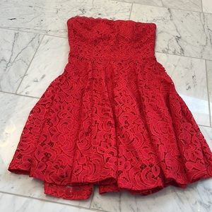 Red lace overlay strapless dress